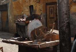 A photograph of a sweet potatoes peddler's cart