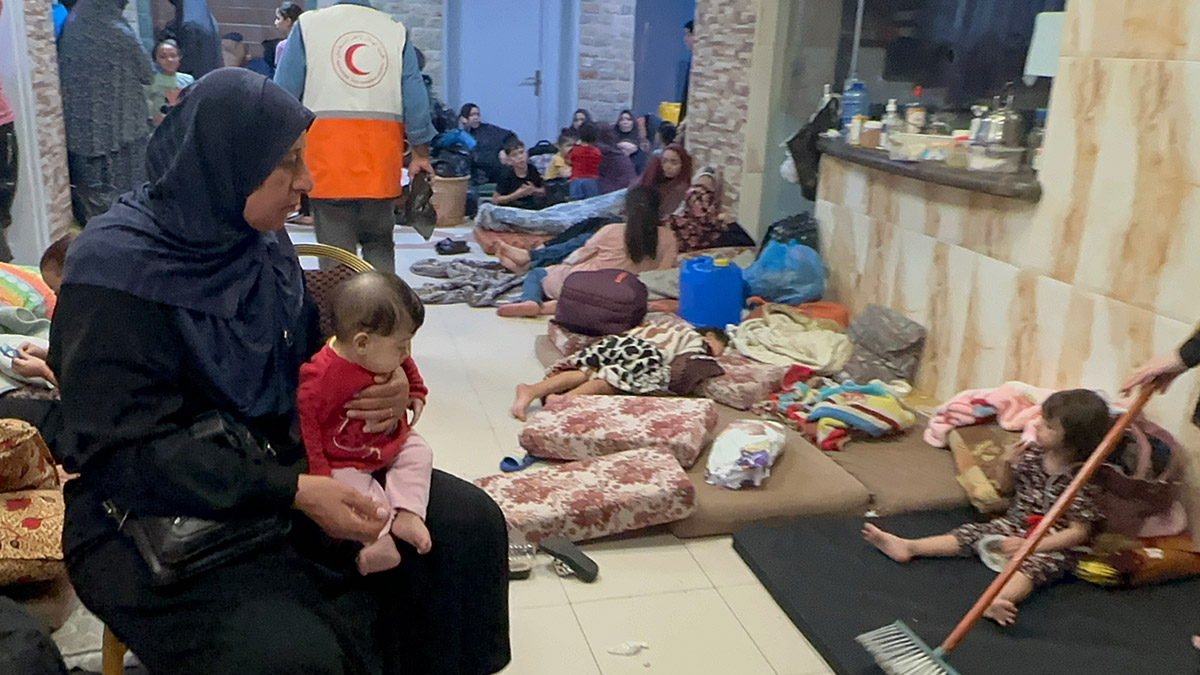 Palestinians take refuge at Al-Quds hospital amid the bombings in Gaza.