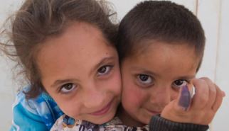 Children display finger marking following vaccination