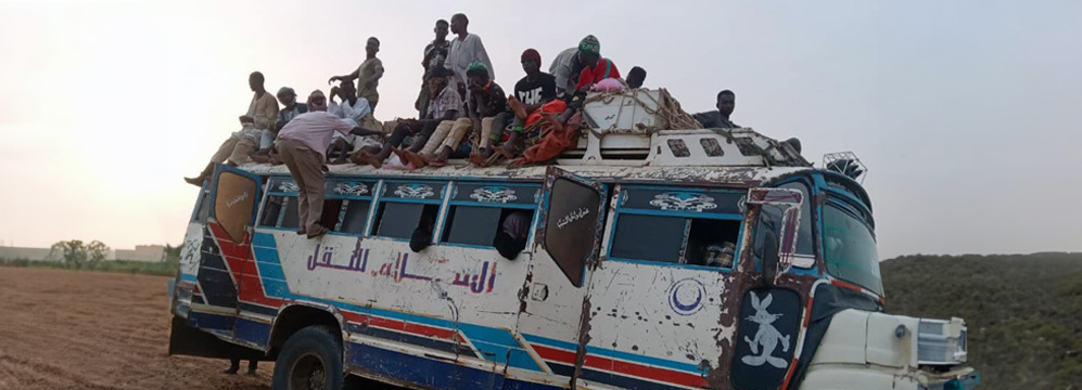 Mohamed Al Hassan Hasab Allah boards a public bus carrying AFP samples for the 5-day drive from Kosti in White Nile to Dongola in Northern State