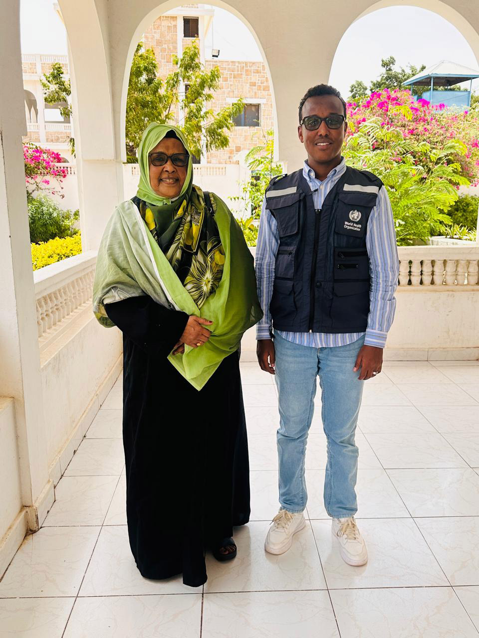 WHO Somalia Communication Officer Khadar Hared is pictured with Maryan Jama Du’ale after interviewing the polio champion about her experiences in Hargeisa. Photo credit: WHO/WHO Somalia