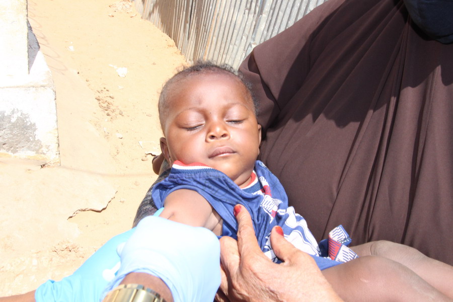 child-receives-measles-vaccination