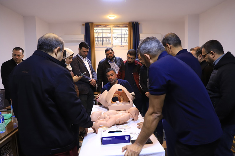 A trainer demonstrates advanced surgical procedures to participants during a hands-on session of the training. Photo: WHO