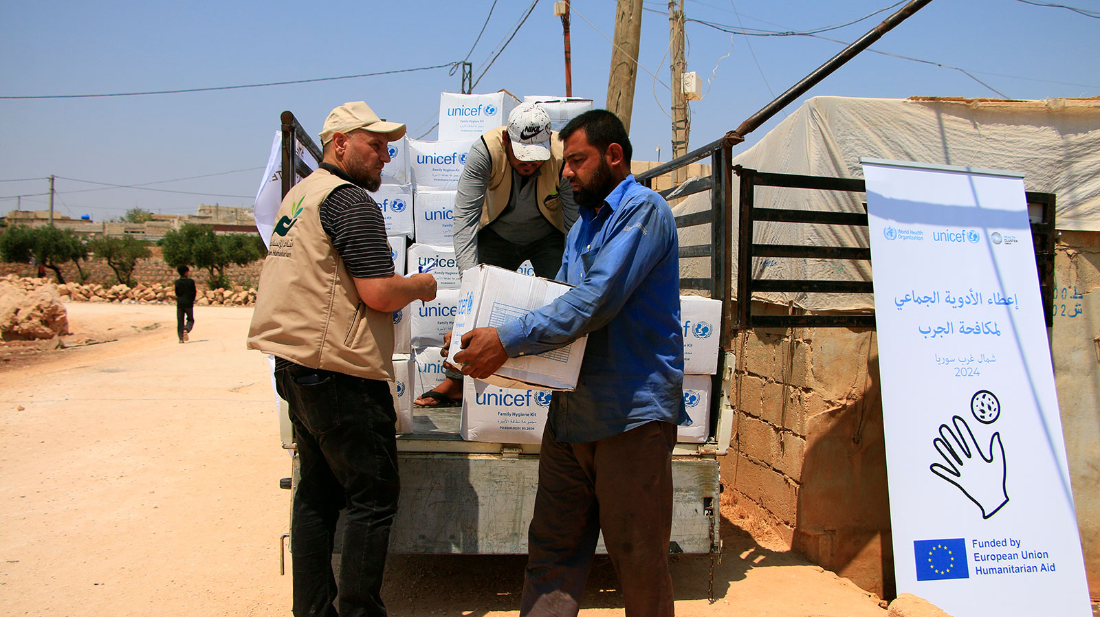 UNICEF-procured hygiene kits are distributed as part of the scabies response in north-west Syria. Photo credit: © Al-Sham Humanitarian Foundation 